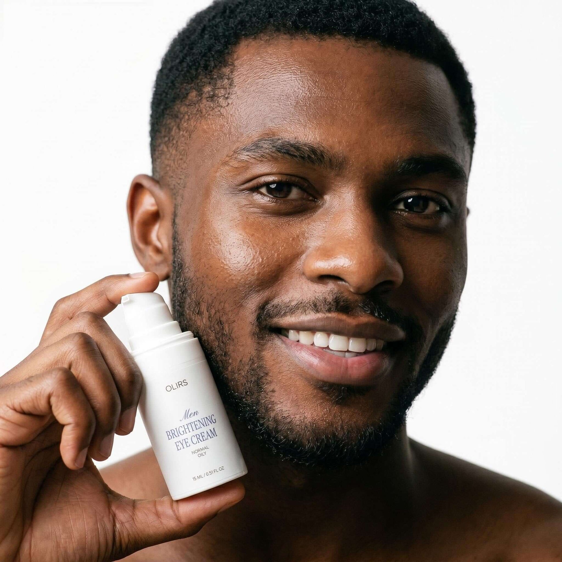 Brightening Eye Cream - Character Holding Product | OLIRS Men's Skincare
